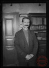 Foire exposition de 1948 - Portrait d'un homme situé dans un bureau de l'administration de la ville