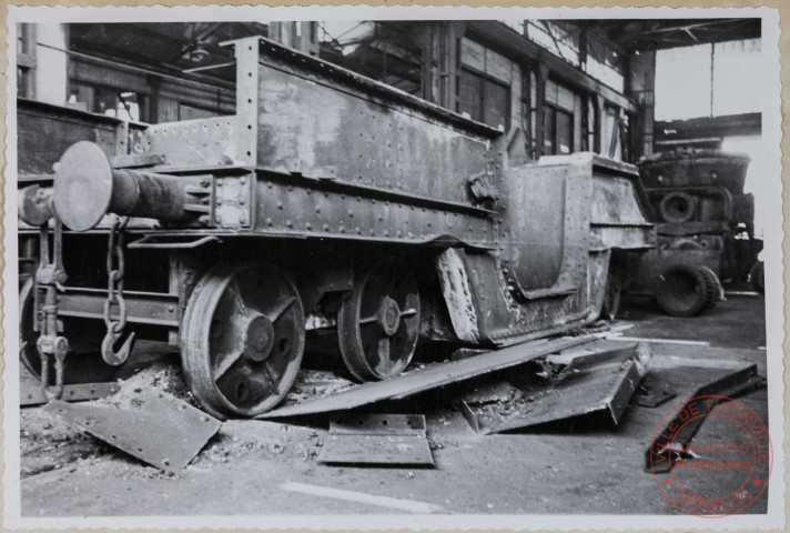 Chariot n°3 de poche à fonte. Exemple d'affaissement du chariot dû à l'excès de chaleur provoqué par des débordements de fonte liquide.