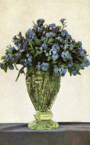 [Vase rempli de fleurs bleues]