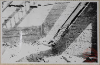 Anciens accumulateurs à minerai. Exemple de cloison en mauvais état.