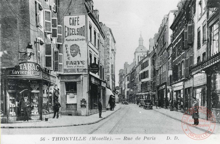 Thionville (Moselle). Rue de Paris. [Tabac Xavier REIBEL, café Excelsior, Au Bon Diable]